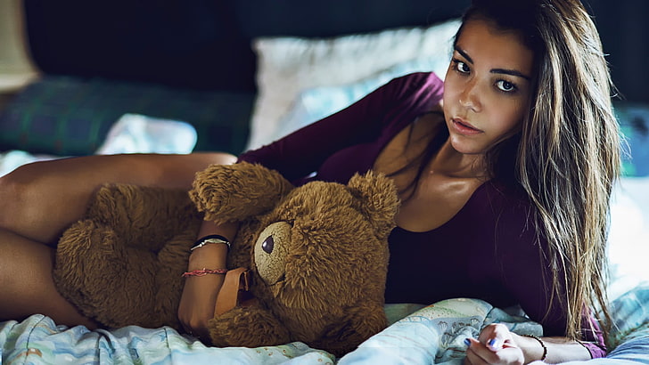 woman lying on bed holding brown bear plush toy, women, model, HD wallpaper