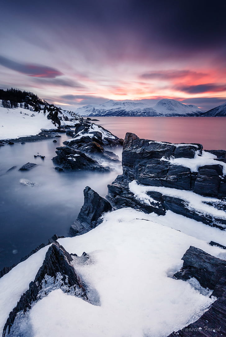 time-lapse photography of snowy hills and body of water during golden hour, ullsfjord, norway, ullsfjord, norway