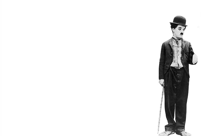 men's black suit, Charlie Chaplin, studio shot, copy space, white background