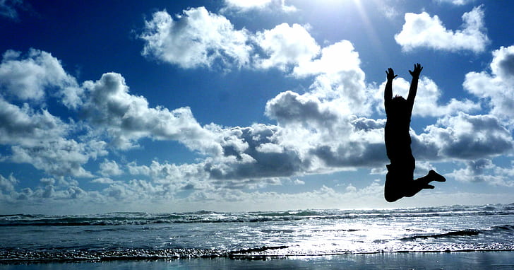 silhouette photography of  person jumping near beach shore during daytime, HD wallpaper