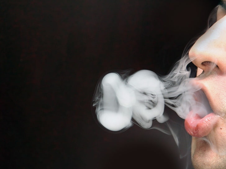 smoking, vape, lips, nose, black background, one person, headshot
