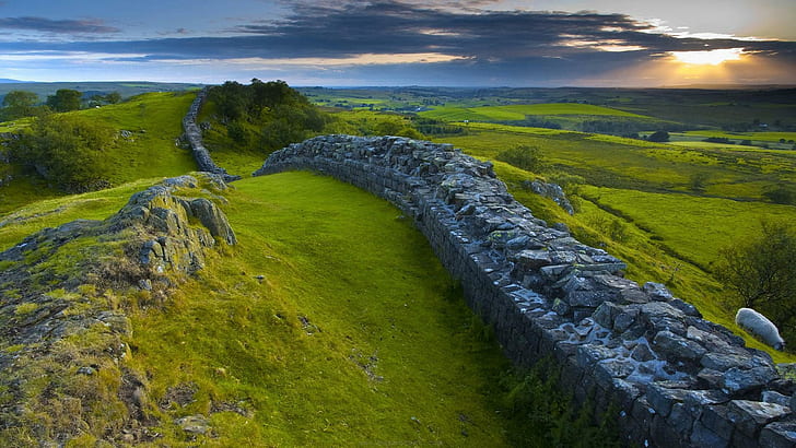 Hadrians Wall In Northern Britain, stones, sheep, fields, clouds