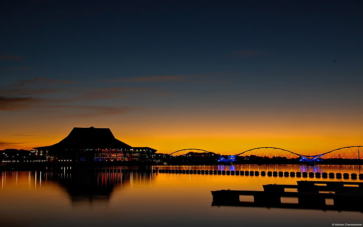 Sunset over Tempe Arizona-Windows 10 HD Wallpaper, silhouette photography of bridge and building HD wallpaper