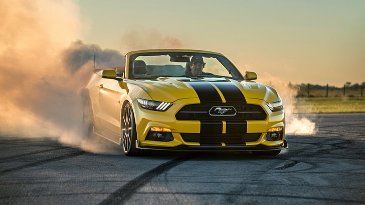 Hd Wallpaper Man Riding Yellow Ford Mustang Convertible With Tires Screeching During Daytime Wallpaper Flare