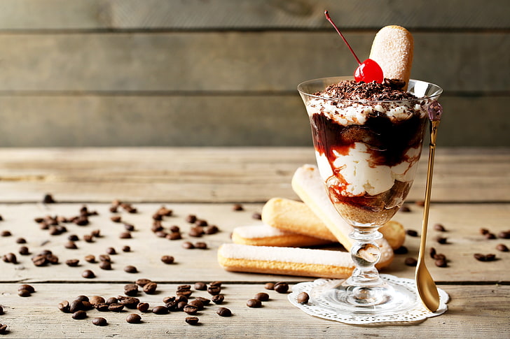 banana sundae with cherry, coffee, grain, cookies, ice cream