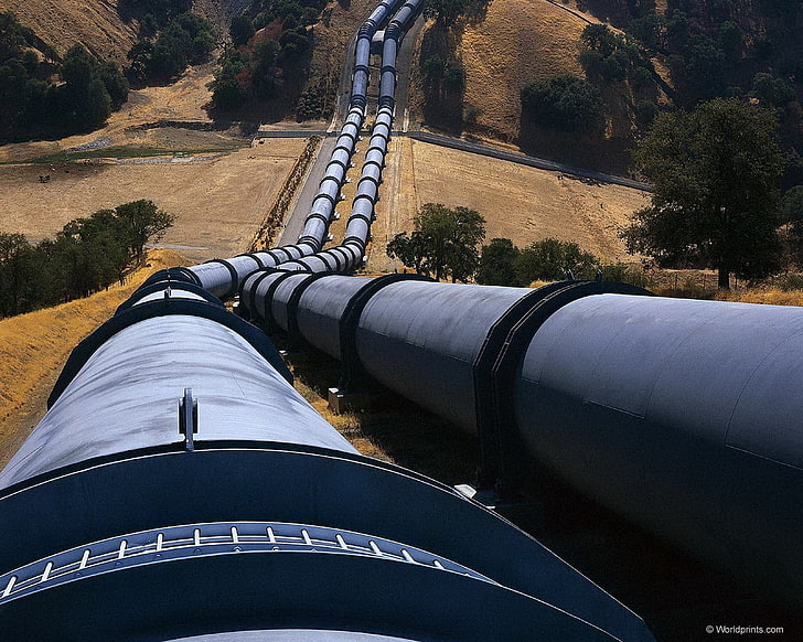 two gray pipes, pipeline, hills, day, plant, tree, no people