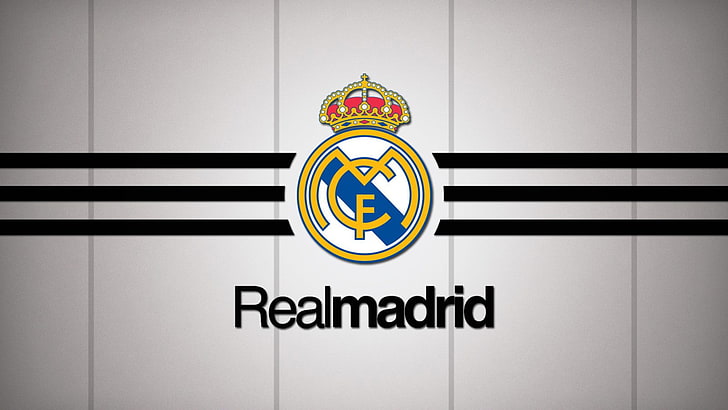 Real Madrid logo, no people, text, indoors, communication, western script
