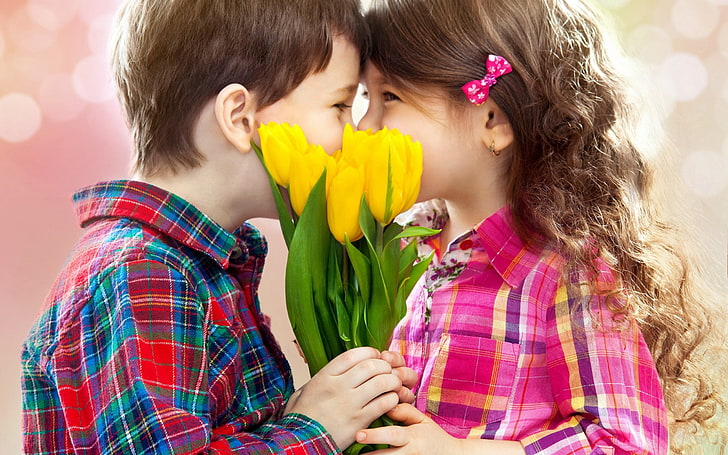 Children Kiss Tulips Flowers, yellow tulip flowers and toddler's pink long-sleeved shirt