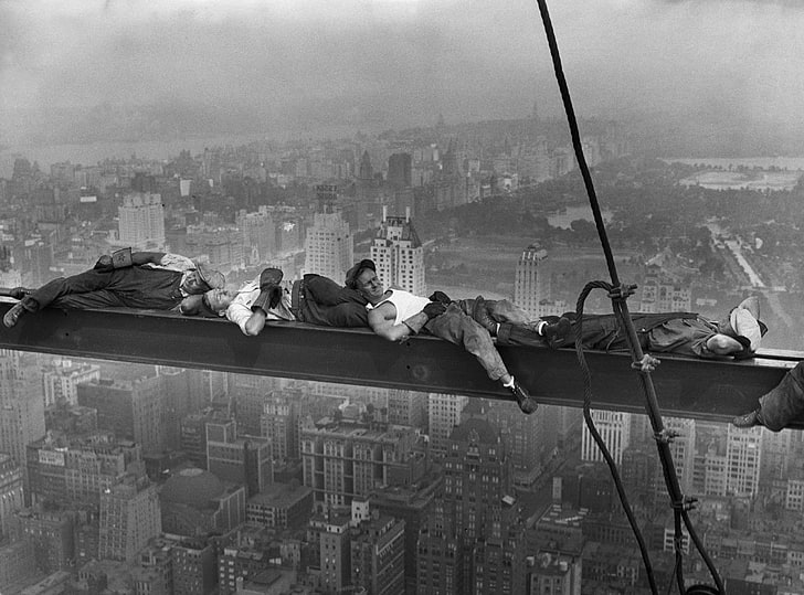 Construction Workers At Height, people sleeping on steel beam hanging on skyscraper wallpaper