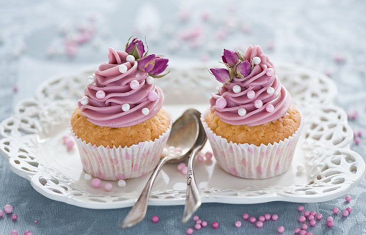 two cupcakes with pink icing on top, flowers, sweets, decoration