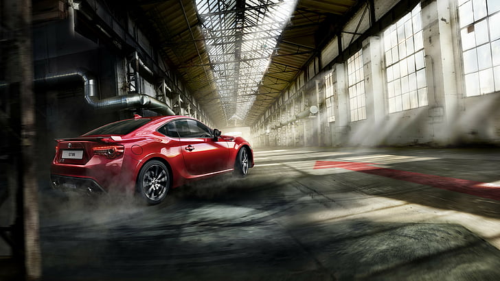 red coupe running inside warehouse during daytime, Toyota GT 86