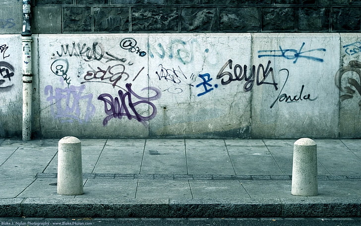 white concrete wall with graffiti, street, text, architecture