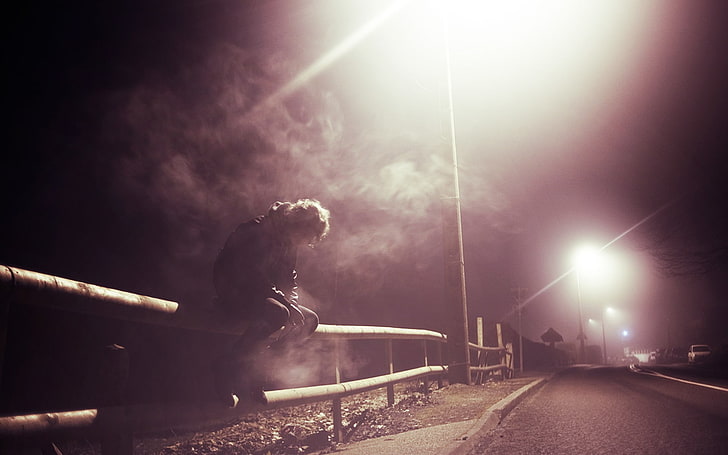 man sitting on fence, sad, men, smoking, road, night, transportation, HD wallpaper