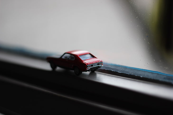 black and red plastic toy, macro, car, window, mode of transportation