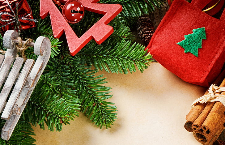 Vintage festive decorations, cinnamon, sleigh, pine-tree, holidays