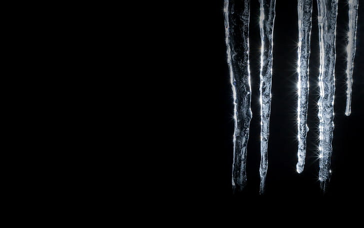 ice icicle, black background, copy space, studio shot, no people