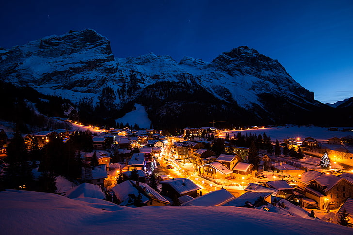 time-lapse photography of cityscape, winter, light, snow, mountains