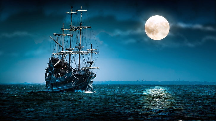 galleon ship on body of water taken during night time with full moon