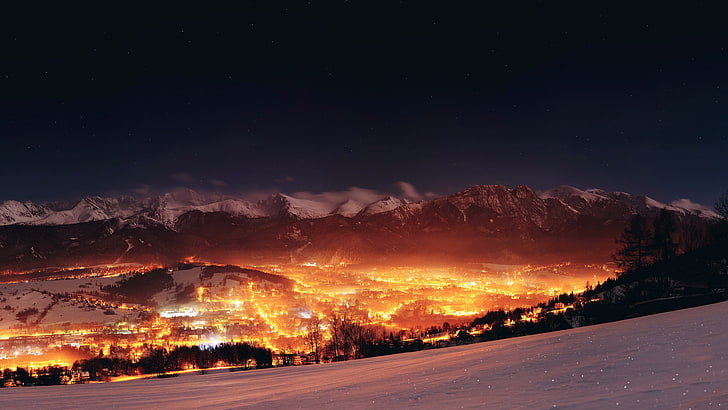 white snow covered mountain, city during nighttime, landscape