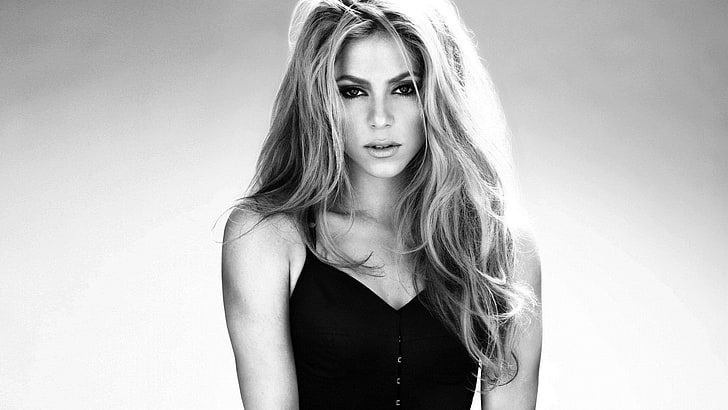 women's black sleeveless top, Shakira, looking at viewer, blonde