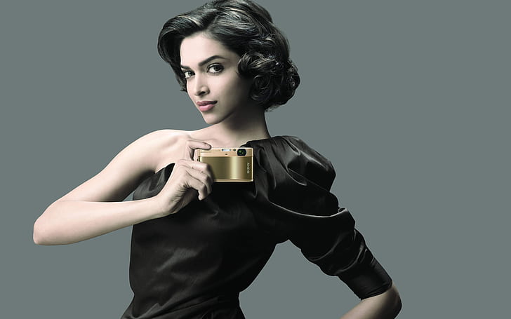 Deepika Padukone Sony, women's black leather suit and compact camera
