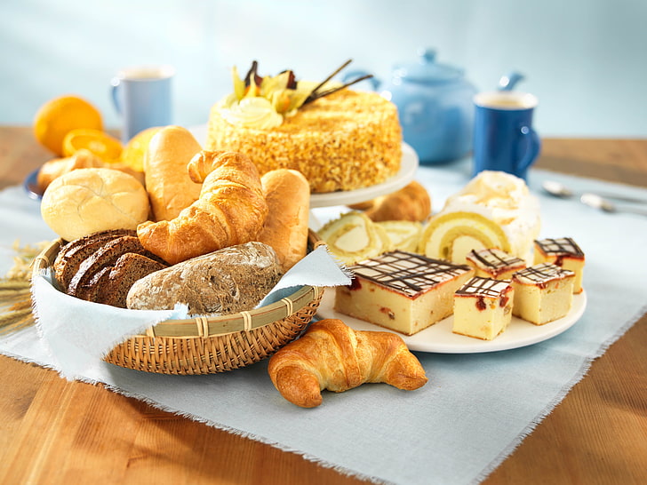 assorted baked breads, pastries, cakes, croissants, table, food