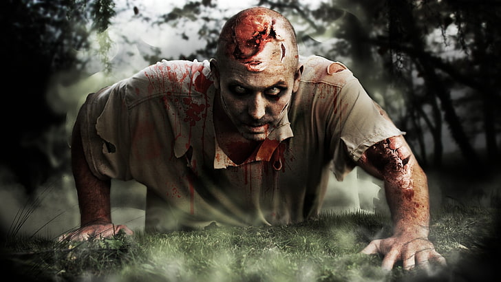 wounded man in brown polo shirt crawling on grass, horror, zombies