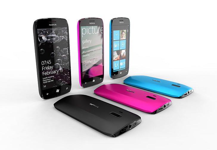 three black, blue, and pink Nokia smartphones, windows phone