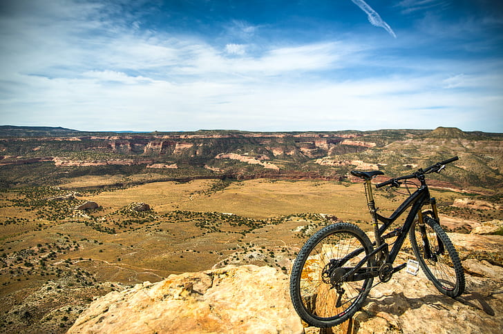 black full-suspension bicycle on brown rocky surface during daytim, HD wallpaper
