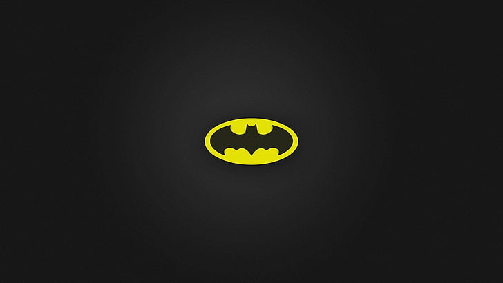 DC Comics Batman logo, yellow, black background, copy space, studio shot