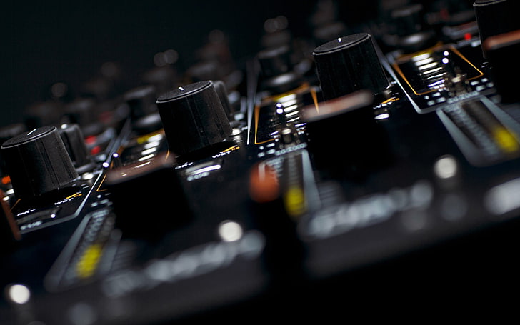 close up photo of black electronic home appliance, mixing consoles