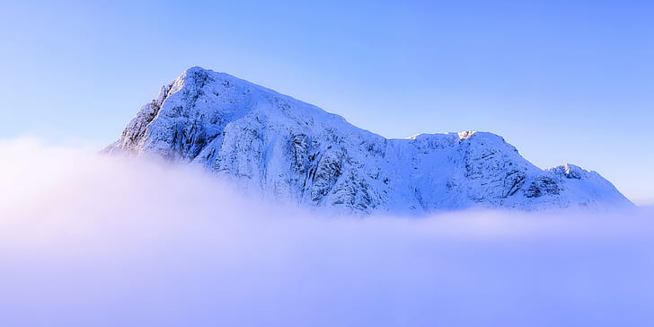 landscape photography of snowy mountain summit above clouds under clear sky during daytime, glencoe, scotland, glencoe, scotland
