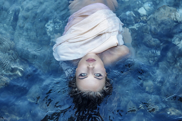 women, brunette, curly hair, blue eyes, top view, water, face