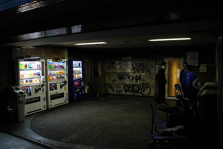 white vending machine, garages, graffiti, ugly wallpaper, people