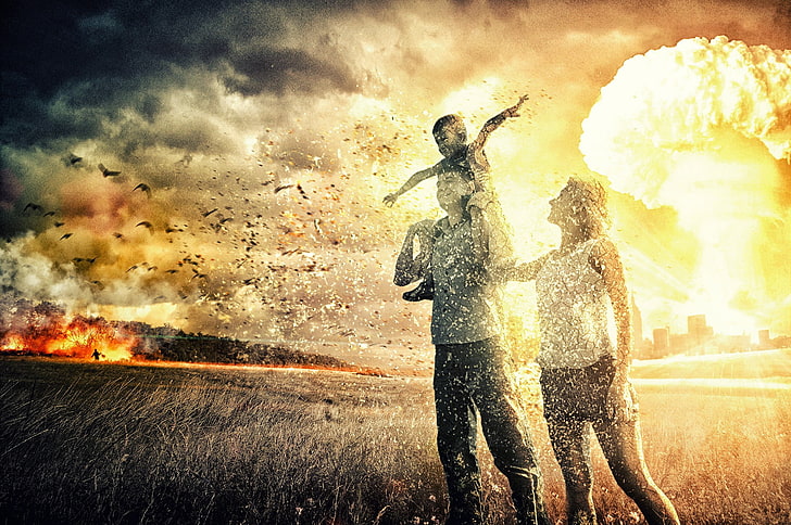woman beside man with son perching on back against nuclear explosion photography