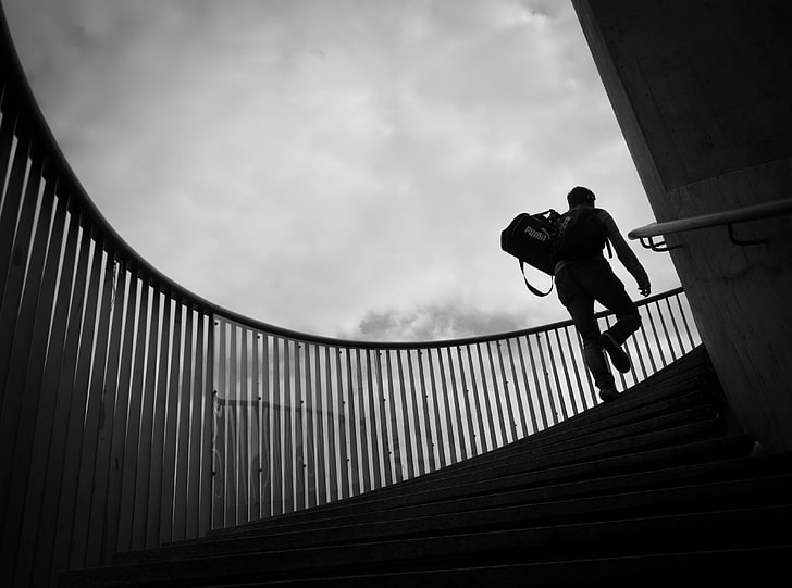 Climbing Stairs, grayscale photography of man walking upstairs