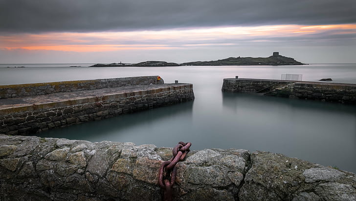 body of water between gray concrete fence, dalkey, dublin, ireland, dalkey, dublin, ireland
