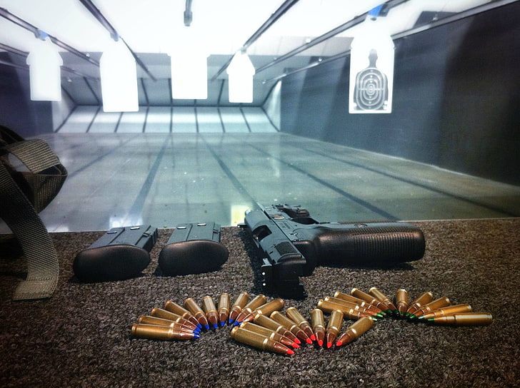 gold pistol bullet lot, gun, ammunition, weapon, indoors, no people