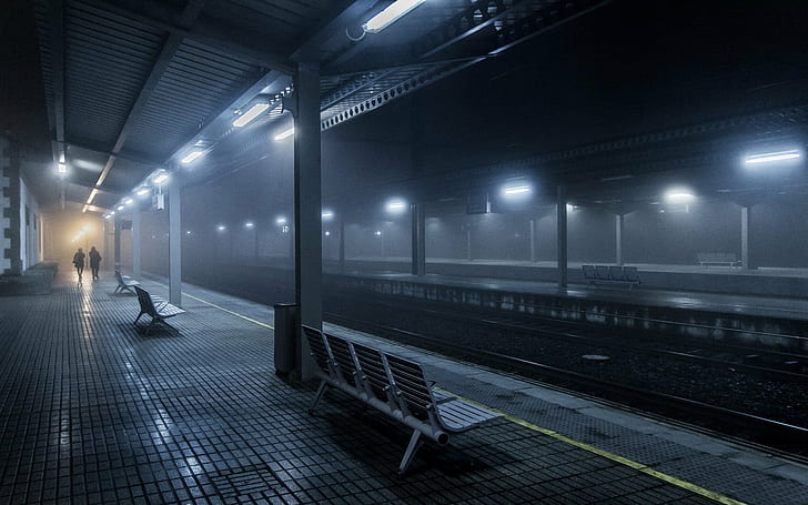urban train station lights railway people bench blue mist spain night