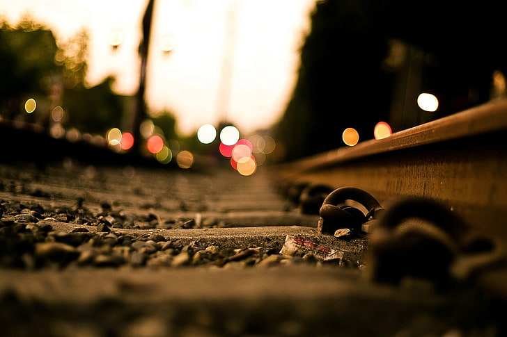 bokeh photography of train railway, selective photo of train rail