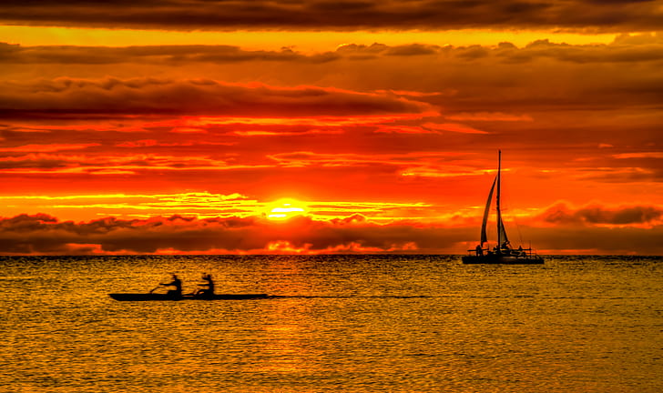 two persons on boat rowing near sailboat during golden hour, Hot Lava