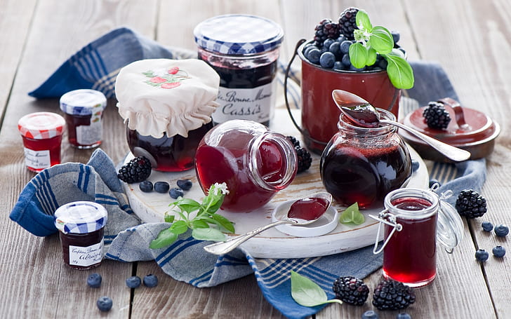 Still life, food, jam, blueberries, blackberries, jars, pots, spoons, pink jelly in bottle lot