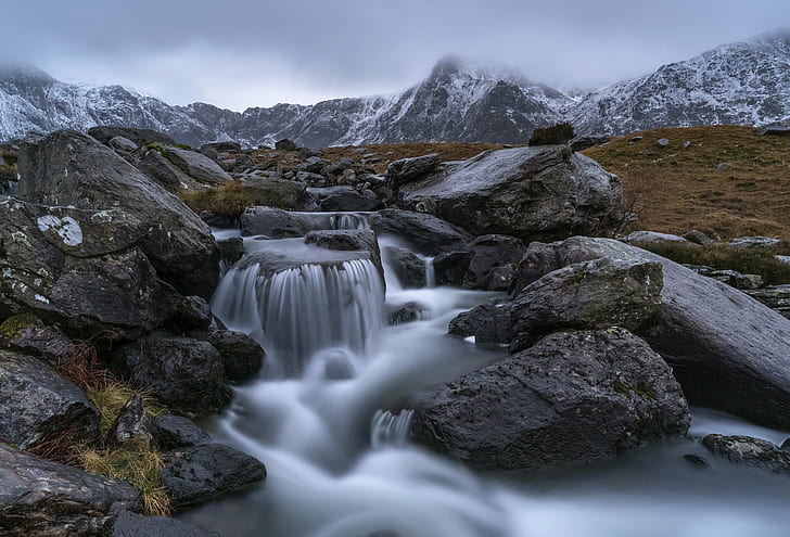 timelapse photography of river between gray rocks, snowdonia, snowdonia