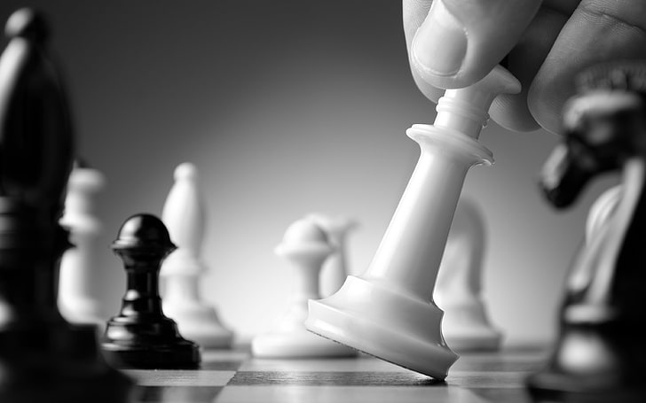 HD wallpaper: person moving chess piece on board, monochrome, macro,  closeup | Wallpaper Flare