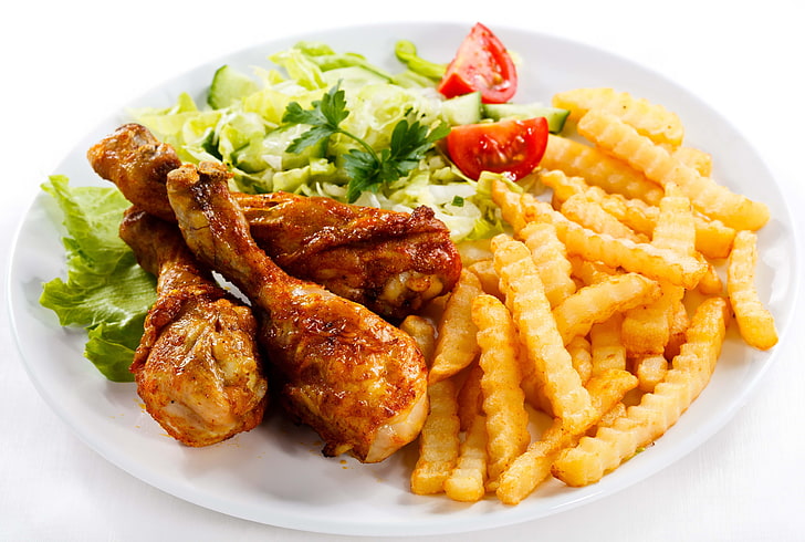 potato fries and fried chickens with vegetable dish, potatoes