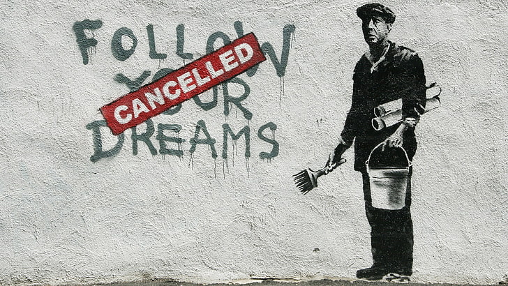 profile of man-themed wall mural, Banksy, graffiti, painting