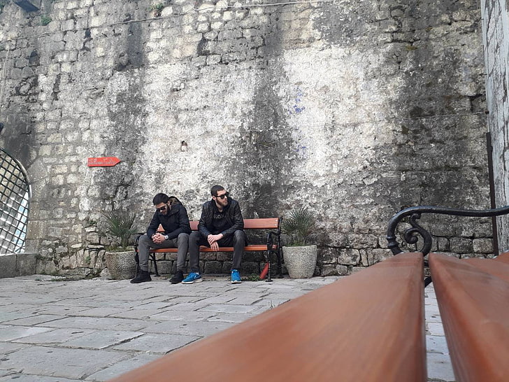 Montenegro, Kotor (town), real people, women, sitting, adult