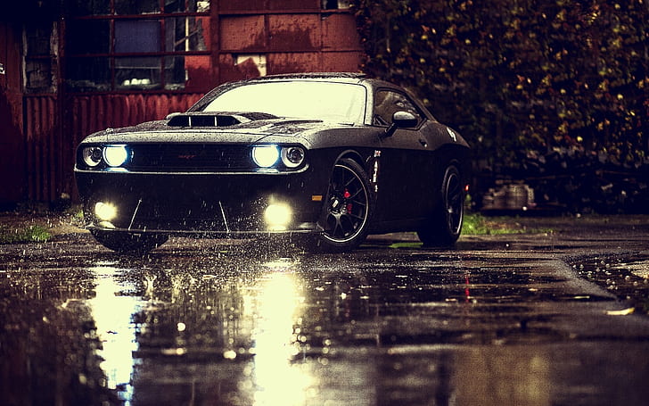 Dodge Challenger SRT black muscle car, rain