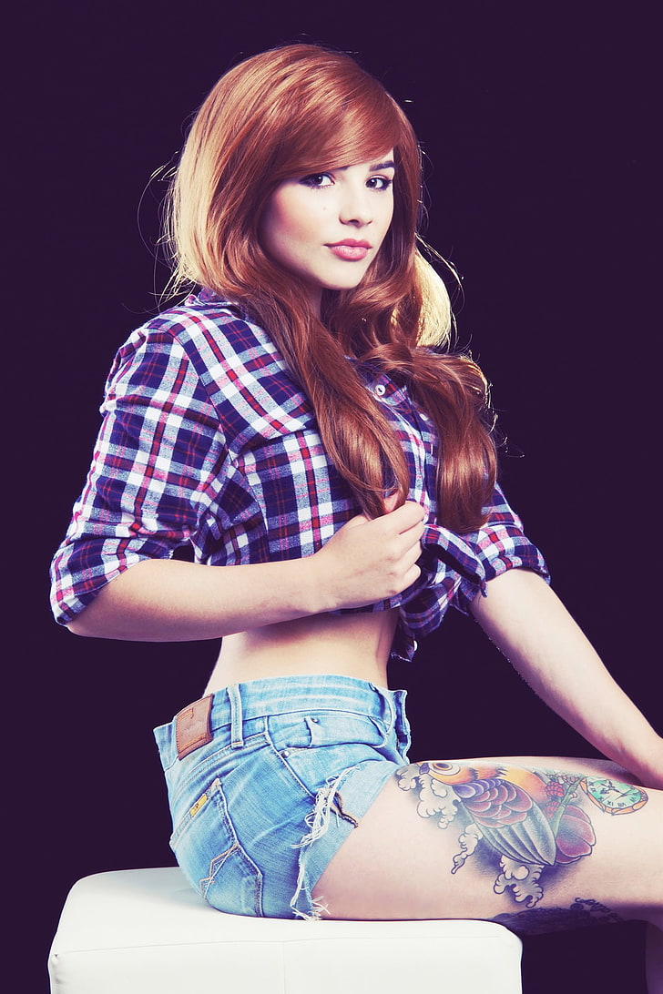 women's purple, red, and white plaid button-up long-sleeved shirt and blue denim short shorts