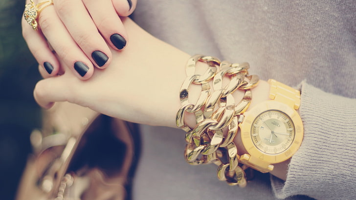 round gold-colored analog watch with link bracelet, hands, watches
